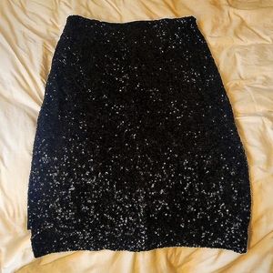 Sequin black pencil skirt by Express. Size M, brand new
